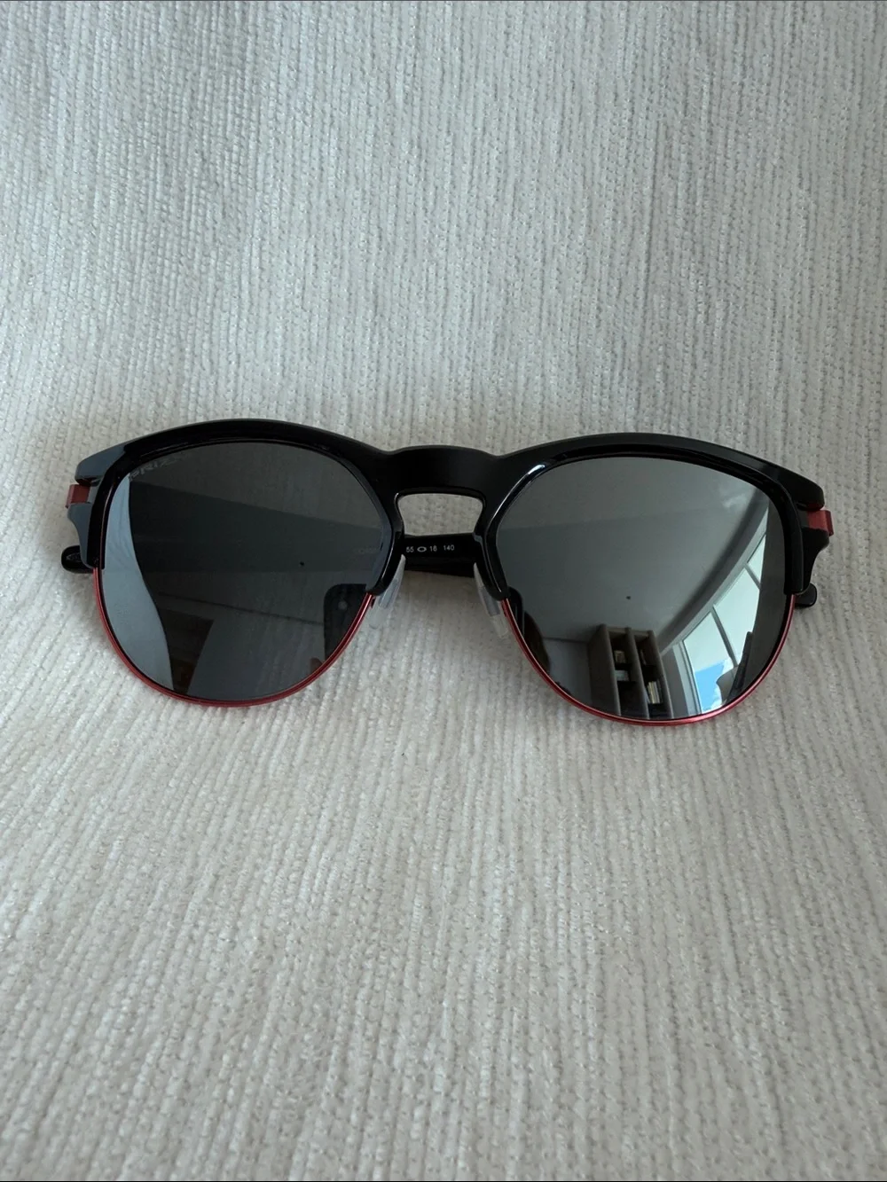 Oakley Latch Key Black and Red Round Frame Sunglasses